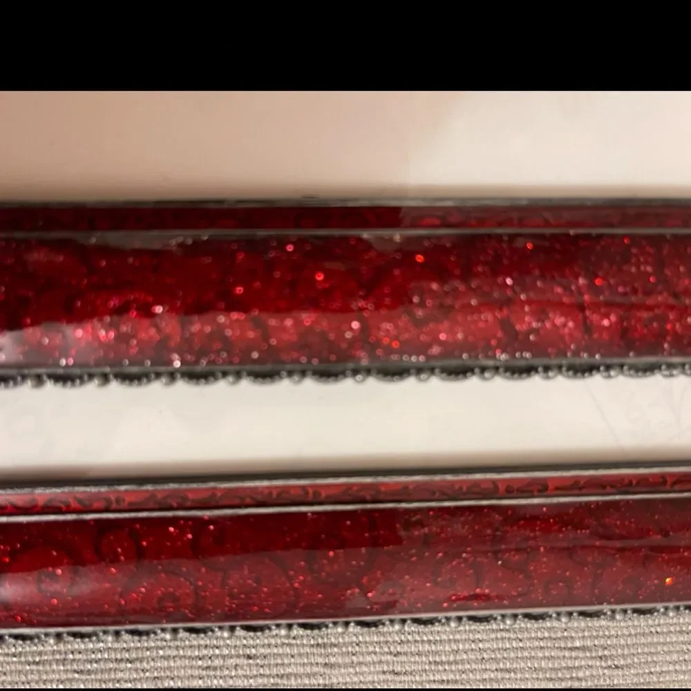 Three burgundy frames